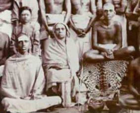Mother iand other devotees, sitting with Ramana Maharshi
